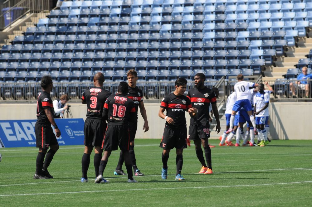 Scorpions commiserate while the Eddies Celebrate. (Photo Courtesy FC Edmonton)