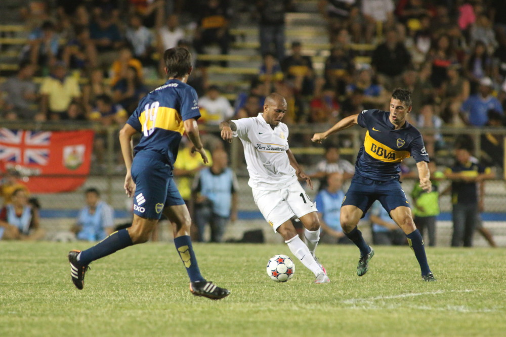 Fort Lauderdale Strikers midfielder Gabriel Rodrigues dos Santos cuts between two Boca Juniors players in an international friendly match on July 1 at Lockhart Stadium. (Photo courtesy of Jon van Woerden / Fort Lauderdale Strikers)