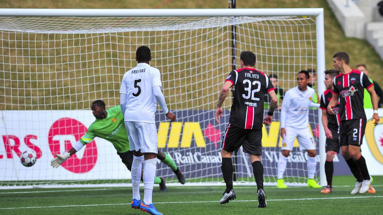 Colin Falvey takes a shot on goal