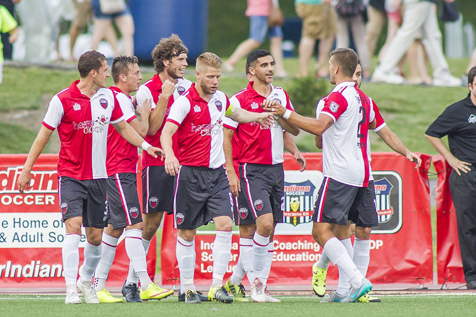 Ottawa celebrate after scoring (Photo: Trevor Ruszkowski/Indy Eleven)