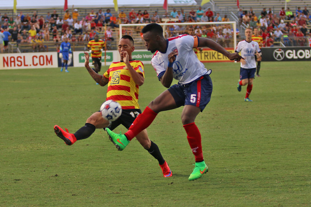 Shawn Chin and Erick Norales battled for the ball in June. (Photo: Fort Lauderdale Strikers)